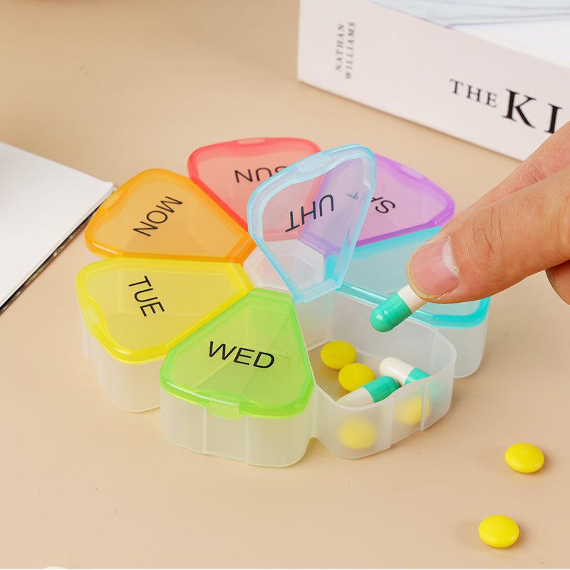 flower shaped weekly pill organizer with daily compartments